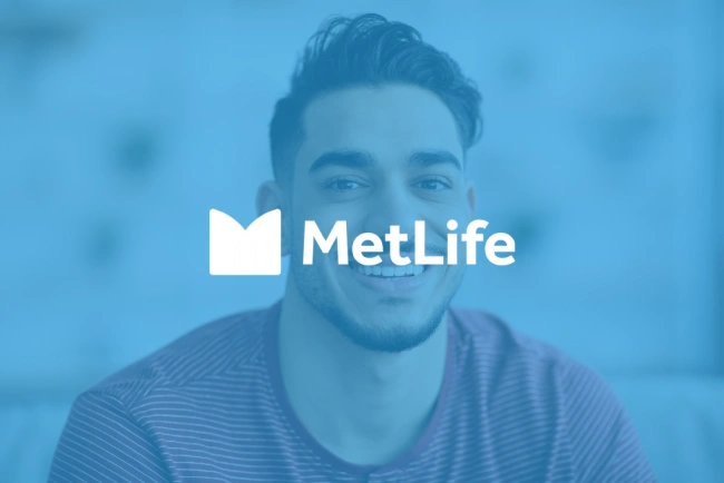 MetLife logo overlay on smiling man in striped shirt against blue background
